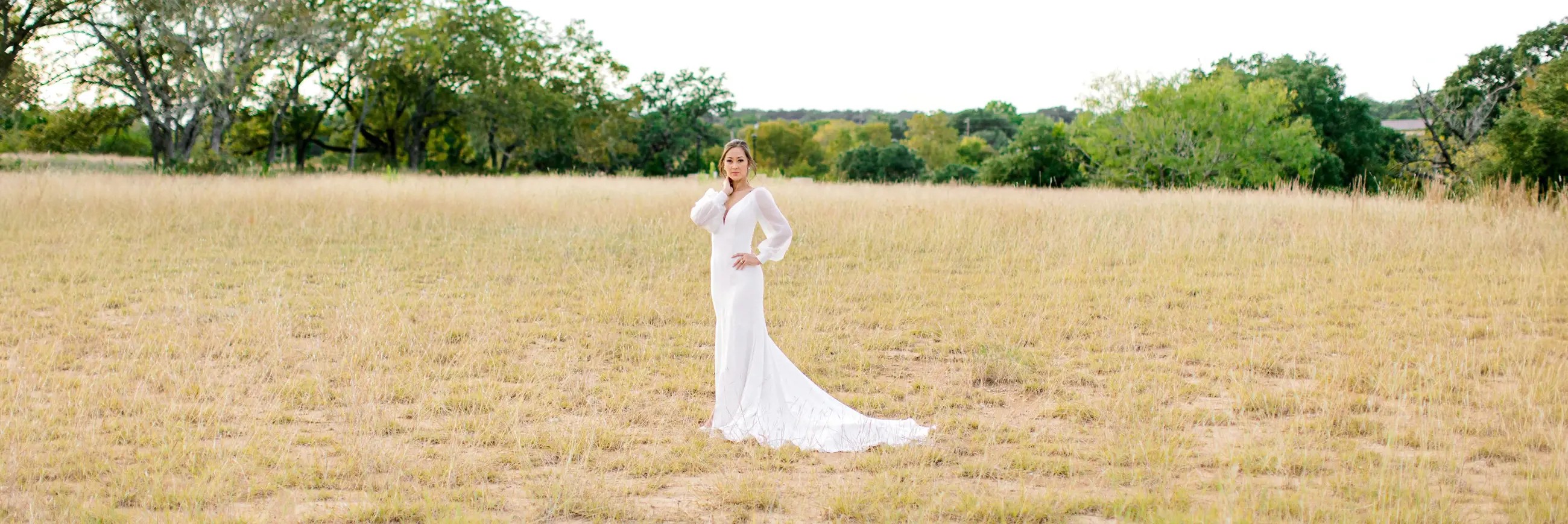 Model wearing a white gown